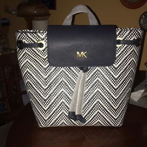 MK Leather Flap Backpack